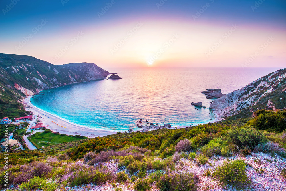 Fantastically fabulous mystical stunning magical landscape with the beach at sunset in Petani Beach, Kefalonia, Greece. Amazing places. Tourist Attractions.