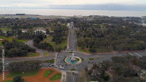 Buenos Aires city drone from above, at Palermo neighborhood, Libertador avenue, and monumento a la carta magna, with rio de la plata river on background. photo