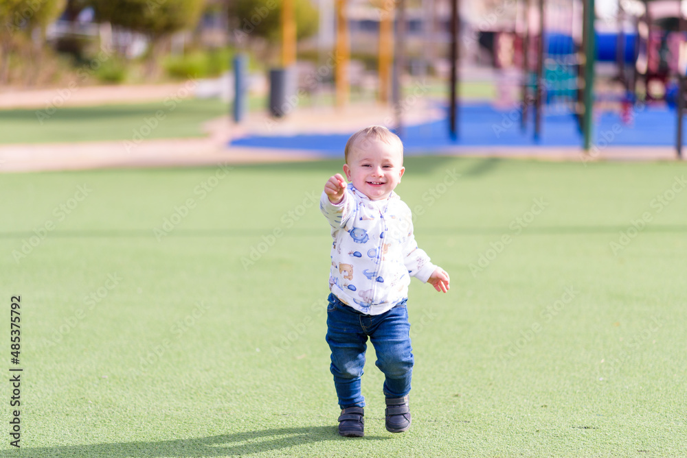 little child playing on the playground