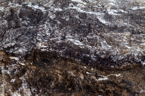 Gray-beige stone texture. Rock. Stone background. Relief surface. Beautiful natural pattern on the plane. Raster image