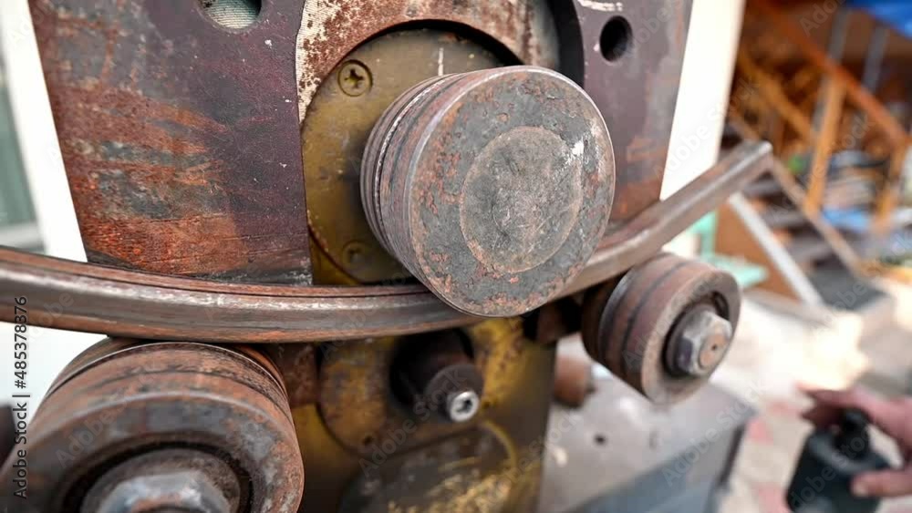 Industrial machine for bending steel pipes and metal rods. Pipe bending machine. The industrial device for bending of metal pipes and plates.