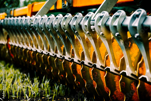 Tractor of arable fields-preparing the land for sowing. Agricultural equipment