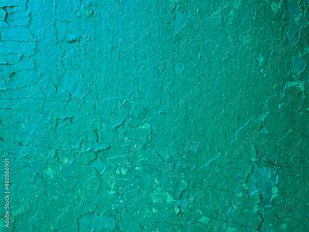 Damaged weathered green background, old with paint worn metal wall surface texture.