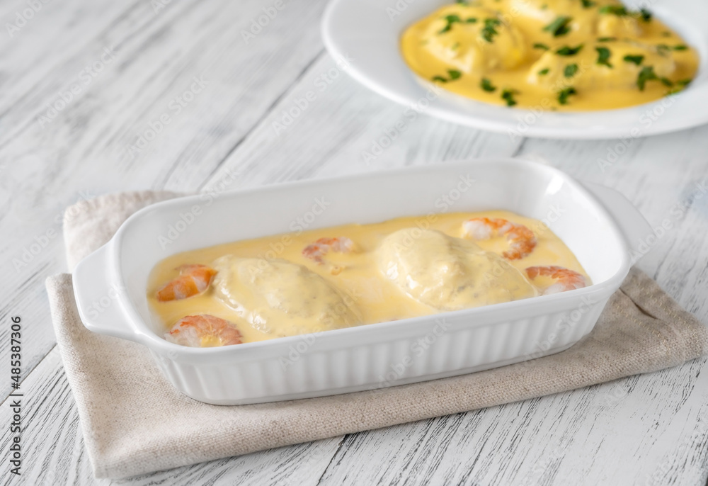 Quenelle with Hollandaise sauce Quenelle with Hollandaise sauce