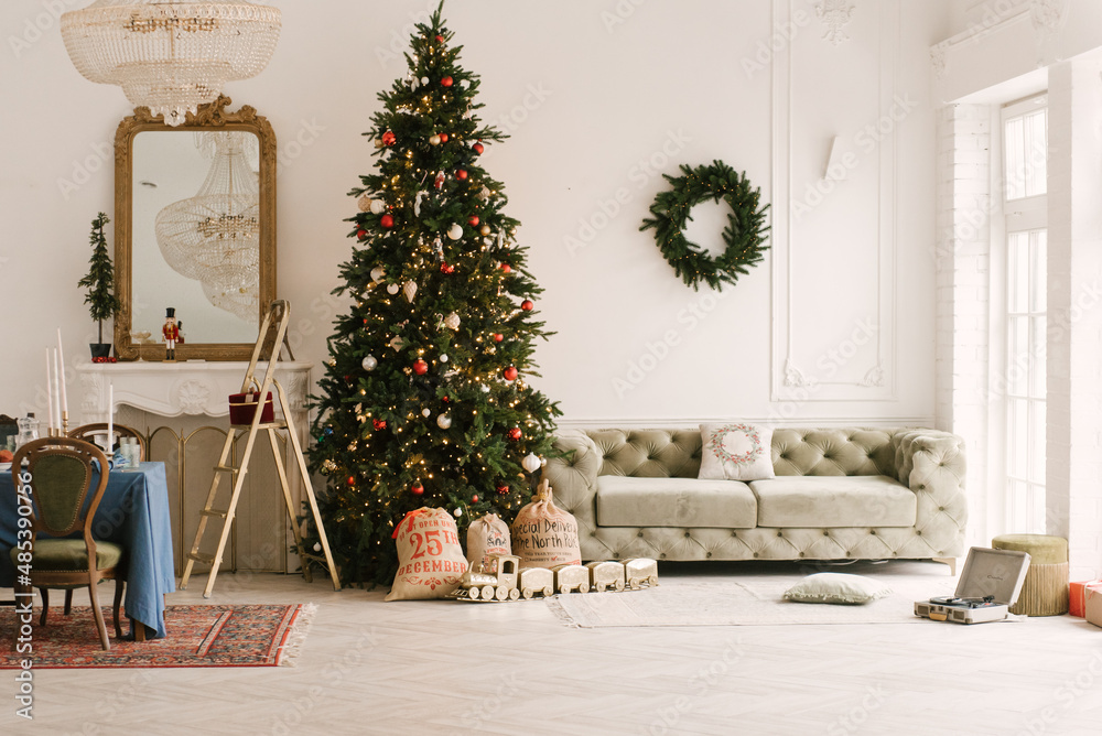 Beautiful living room interior with fireplace and Christmas tree, Christmas decor