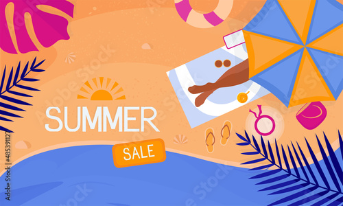 Banner summer discount. A woman is sunbathing on the beach.