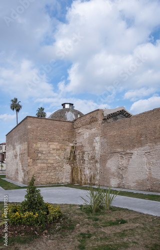 Historical Turkish bath dome and brick wall. Irmak Hamami. Adana, Turkey.