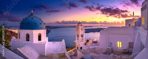 Fantastic Sunset night view of traditional Greek village Fira on Santorini island, Greece, Europe. luxury travel. famous travel landscape. Summer holidays. Travel concept background.