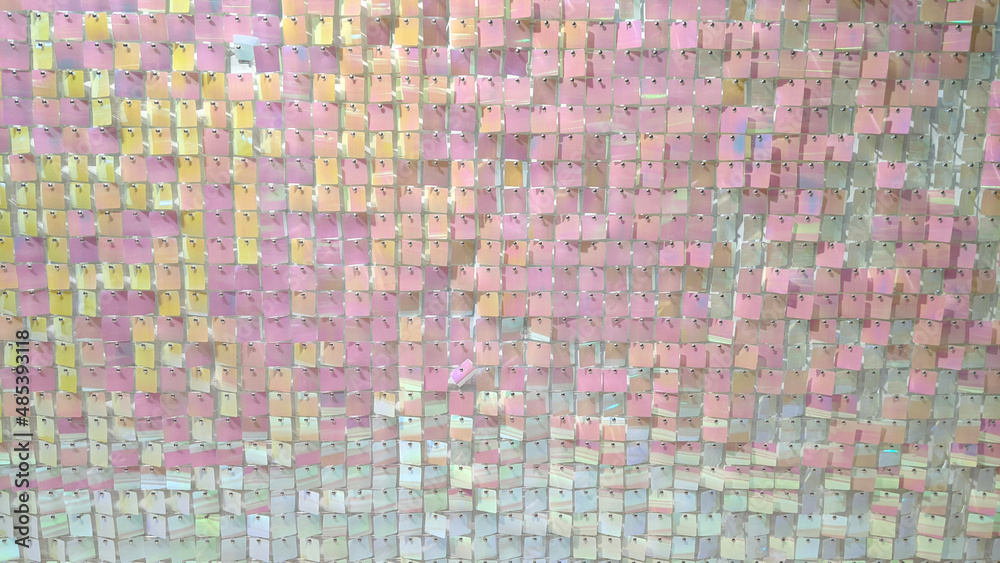 Photo zone with pink mother-of-pearl sequins made of squares