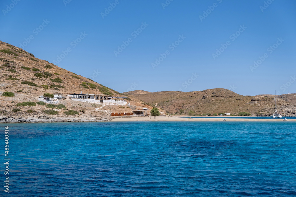 Kythnos Greek island, Greece. Kolona sandy beach, view from the sea. Sunny day Kythnos Greek island, Greece. Kolona sandy beach, view from the sea. Sunny day
