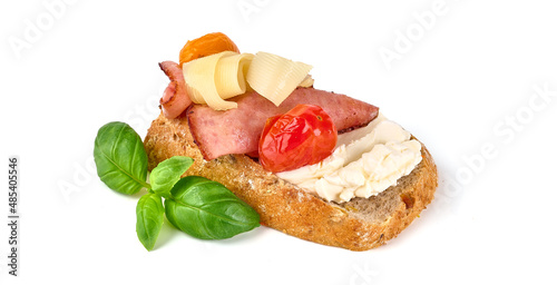 Bruschetta with cream cheese and gouda cheese, isolated on white background. High resolution image.