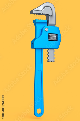 Adjustable pipe wrench, spanner or plumbing tool isolated on yellow background. photo