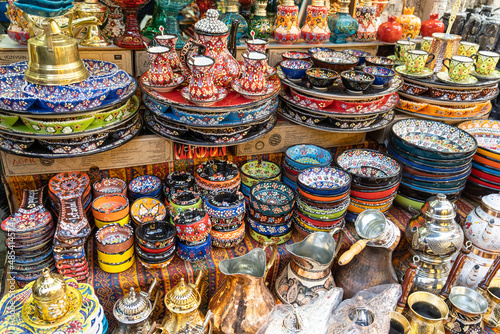 Handmade ceramics, pottery, bowl in the Grand Bazaar, Istanbul, Turkey. Handmade gift ceramic bowls, pottery, and plates. © SalihYunus