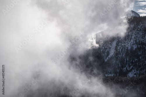 Wetterstein - winter landscape with snow covered mountains and dramatic fog