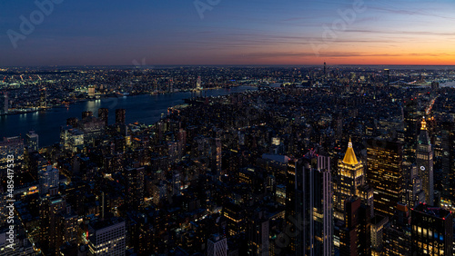 Beautiful night paronama cityscape of new york city downtown with a colourful sky