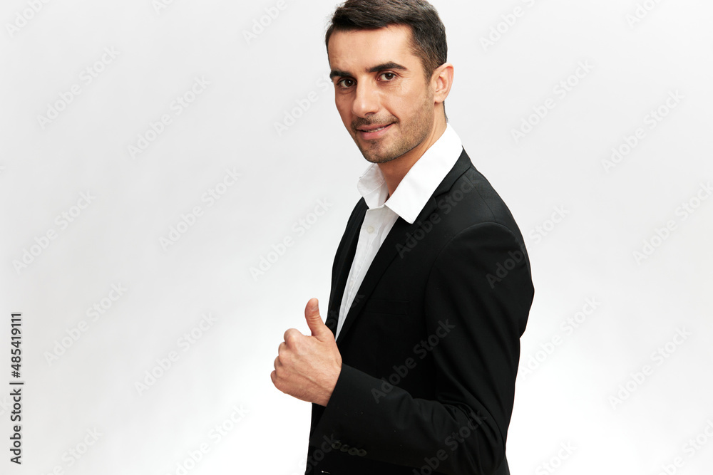 handsome man in a modern suit emotion self-confidence official isolated background handsome man in a modern suit emotion self-confidence official isolated background