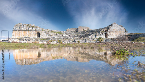 reflection of Miletus ancient theater from rain water,Soke,Aydin,Turkey photo