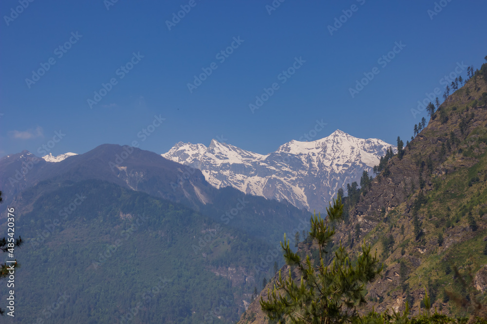 View of alpine snow-capped peaks in the Himalayas