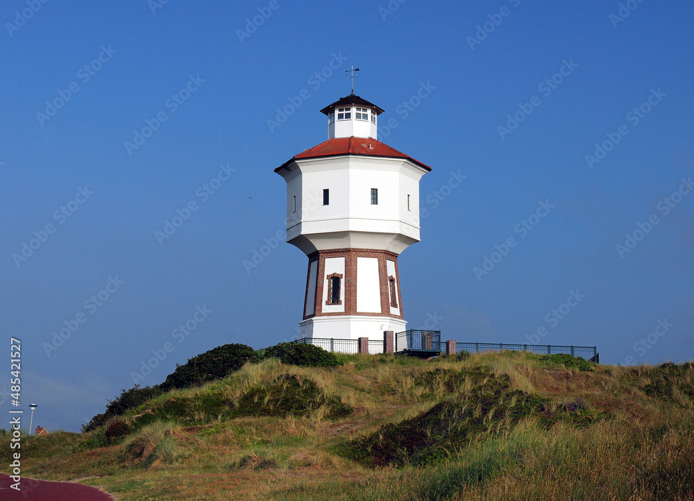 Ancient Water Tower On The East Frisian Island Langeoog Germany On A Beautiful Sunny Summer Day With A Clear Blue Sky