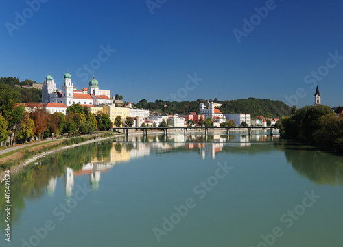 View To The Inn River Side Of The Old City Of Passau Germany On A Beautiful Sunny Summer Day With A Clear Blue Sky