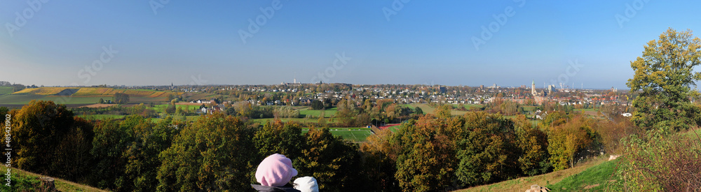 Woman And Her Child Enjoying The Panorama View From Mount Saint Peter To The Cityscape Of Maastricht Netherlands On A Beautiful Sunny Spring Day With A Clear Blue Sky