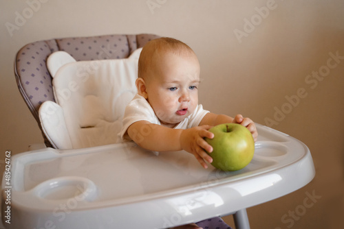 baby with apple