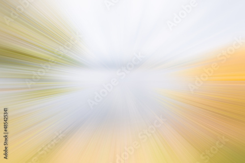 Linear motion blur. Natural yellow and light blue sky colours