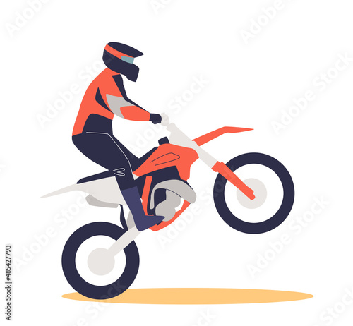 Extreme man rising sport motorbike. Motorcyclist doing tricks on motorcycle