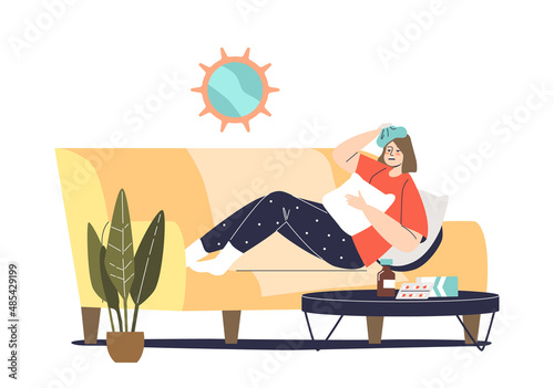 Unhealthy young woman lying on couch at home. Female suffer from stomach ache, headache or migraine