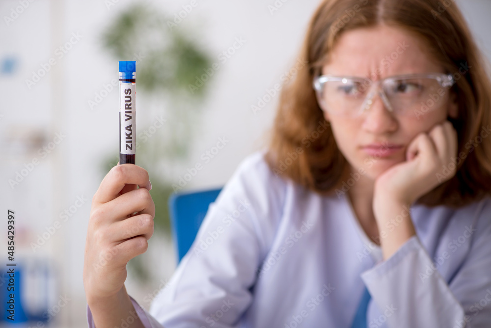 Young female hematologist working at the lab Young female hematologist working at the lab