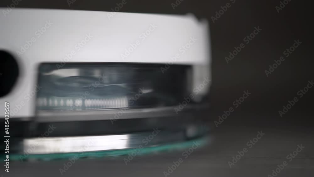 Automatic robot vacuum cleaner cleaning the room. Drive and turns. Automatic robot vacuum cleaner cleaning the room. Drive and turns.