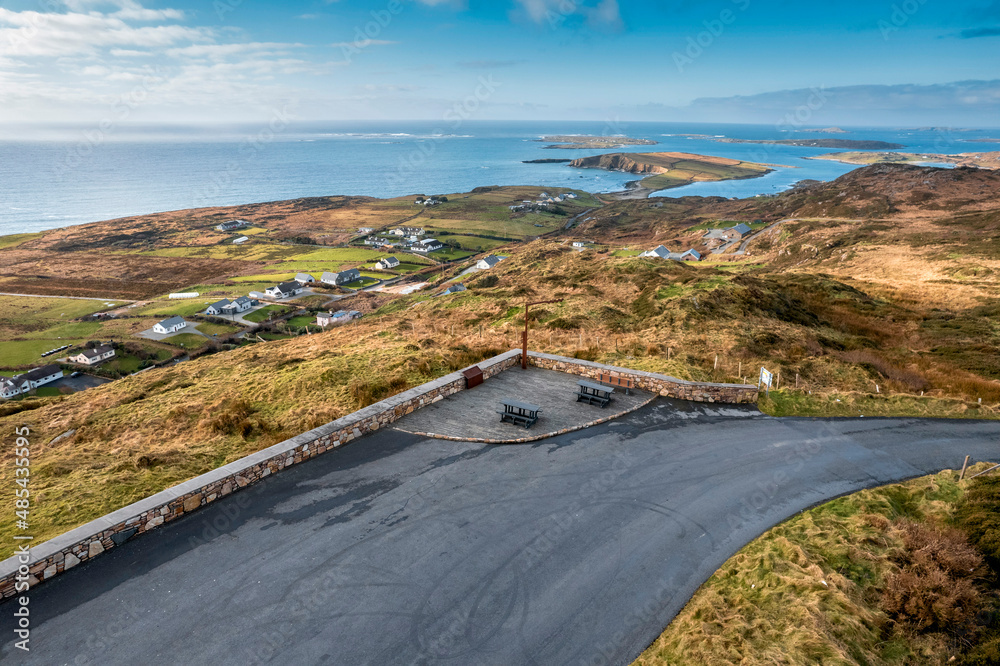 Sky road car park and stunning view on beautiful nature scene. Aerial view. Clifden, county Galway, Ireland. Irish famous landscape and popular tourist route with stunning scenery Sky road car park and stunning view on beautiful nature scene. Aerial view. Clifden, county Galway, Ireland. Irish famous landscape and popular tourist route with stunning scenery