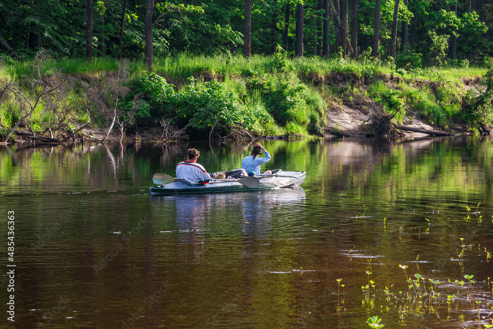 kayaking on river side view