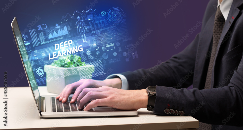 Businessman working on laptop Businessman working on laptop