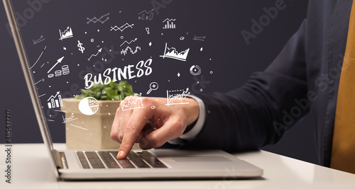 Businessman working on laptop, business concept