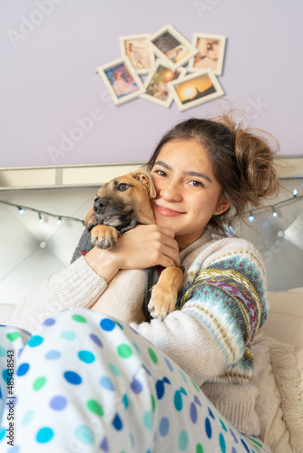 girl playing with dog