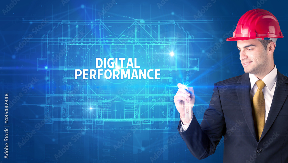 Handsome architect drawing with helmet