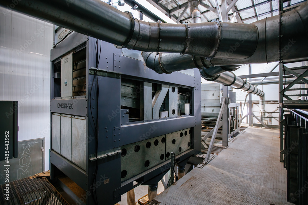 Fototapeta premium Modern grain cleaning and separation equipment in milling factory