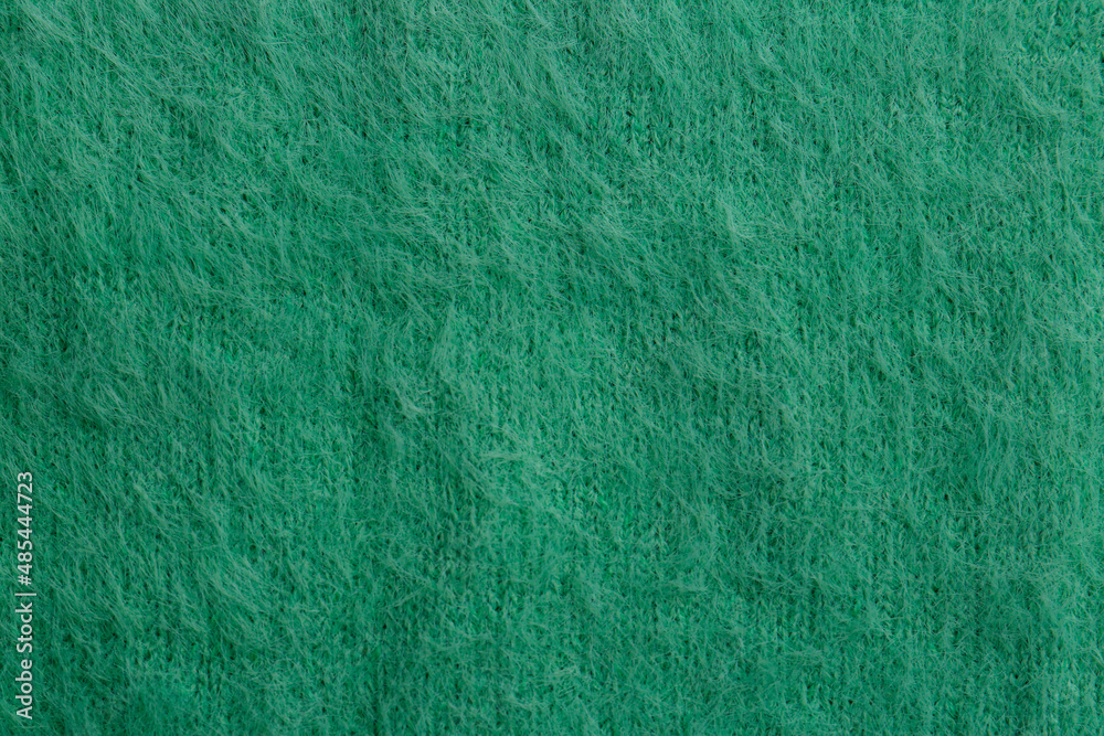 Beautiful green fabric as background, top view Beautiful green fabric as background, top view