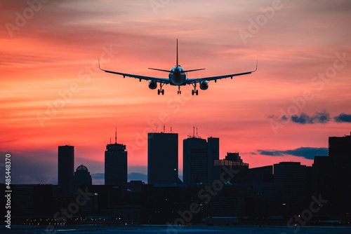 Plane Landing in Boston at sunset