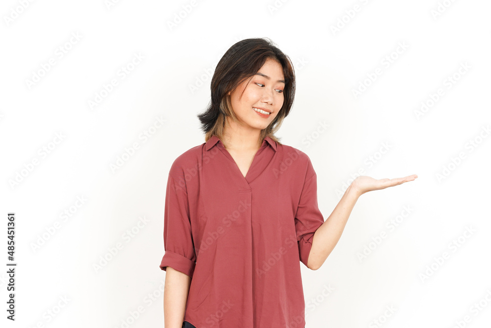 Showing and Presenting Product on Open Palm Of Beautiful Asian Woman Isolated On White Background Showing and Presenting Product on Open Palm Of Beautiful Asian Woman Isolated On White Background