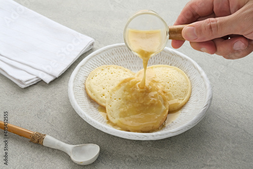 Serabi Durian, Indonesian pancake made of rice flour and coconut milk, served with durian sauce.
 photo