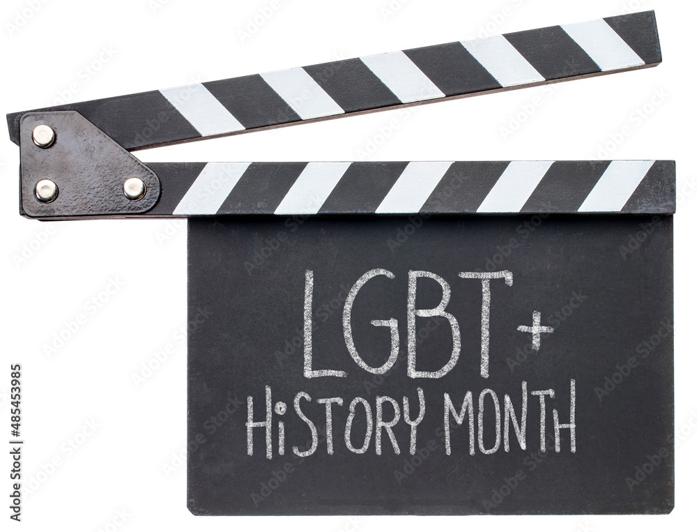 Obraz premium LGBT Heritage Month, white chalk handwriting on a clapboard, reminder of annual monthly event