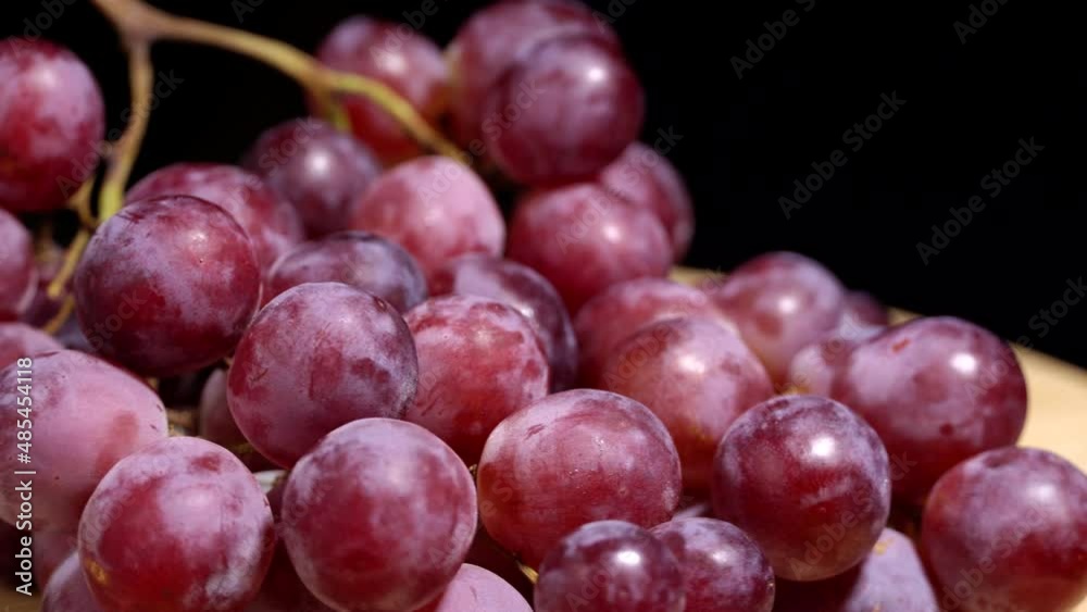 Fresh red grapes rotation background Fresh red grapes rotation background