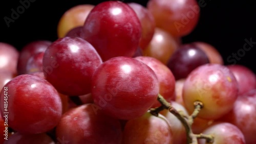Fresh red grapes rotation background