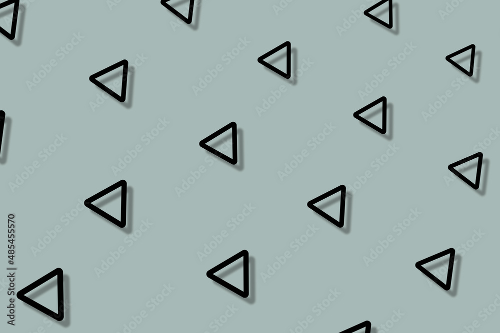 Pattern of black geometric shapes in retro, memphis 80s 90s style. Triangles shapes on grey background with shadows. Vintage abstract background Pattern of black geometric shapes in retro, memphis 80s 90s style. Triangles shapes on grey background with shadows. Vintage abstract background
