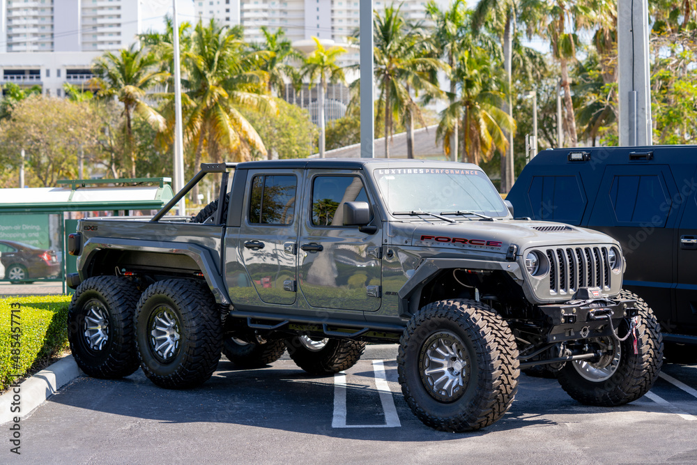 Miami, FL, USA - February 5, 2022: Photo of a custom built Jeep Wrangler  Rubicon 6x6 6 wheel drive Stock Photo | Adobe Stock