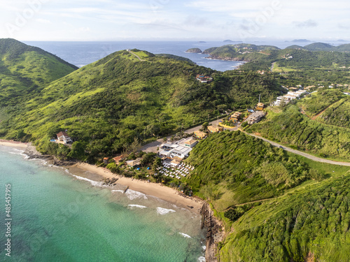 Amazing view of seaside town going up and dark blue sea and clear water beach - Armação de Búzios, Rio de Janeiro, Brazil photo