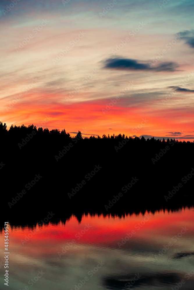 Sunset lake silhouette in Finland