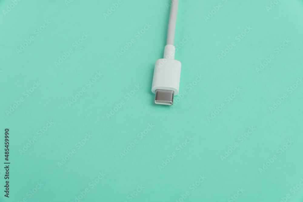 Fototapeta premium USB cable type C over blue background